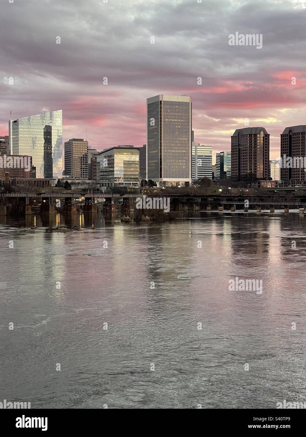 Cloudy sunrise over the Richmond skyline and the James river. Stock Photo