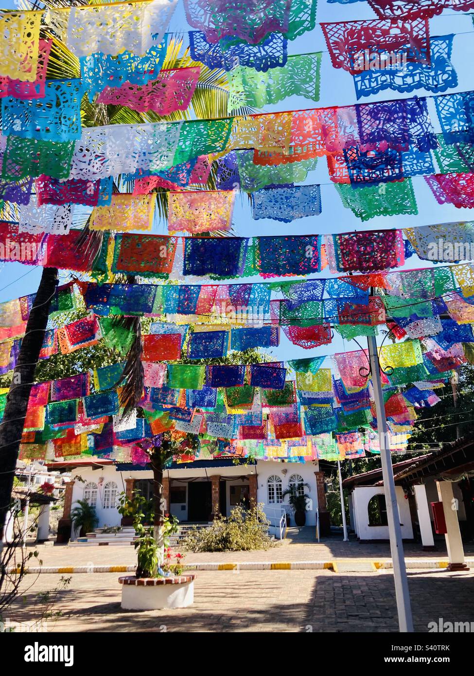 Tibetan peace flags with Mexican prayers and wishes. Stock Photo