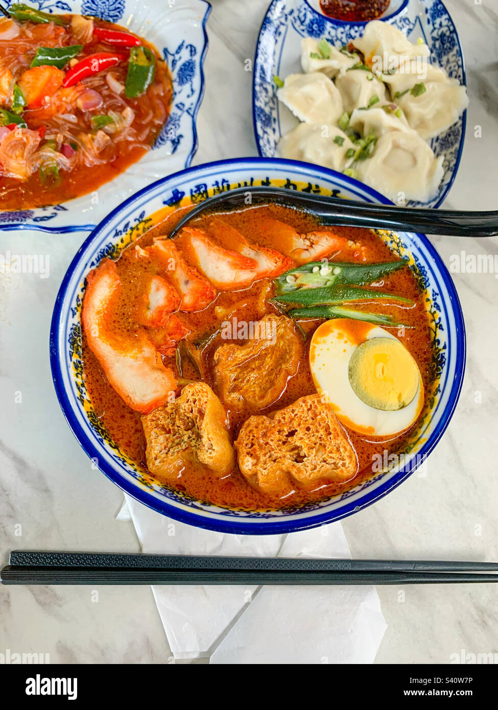Having the best dish ‘Mee Curry’ in a chinese restaurant.🍽😋 Stock Photo