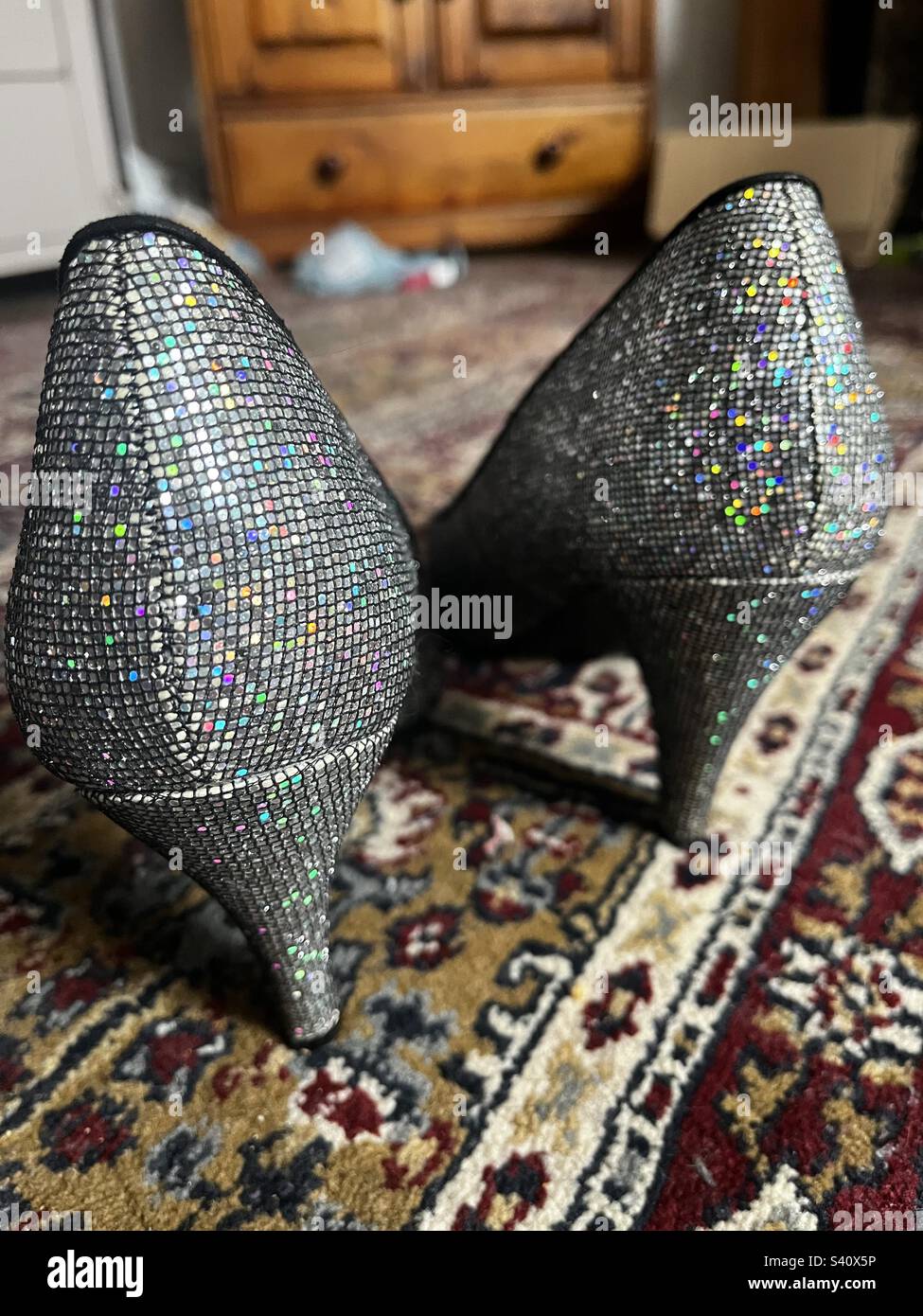 Shoes on carpet Stock Photo Alamy