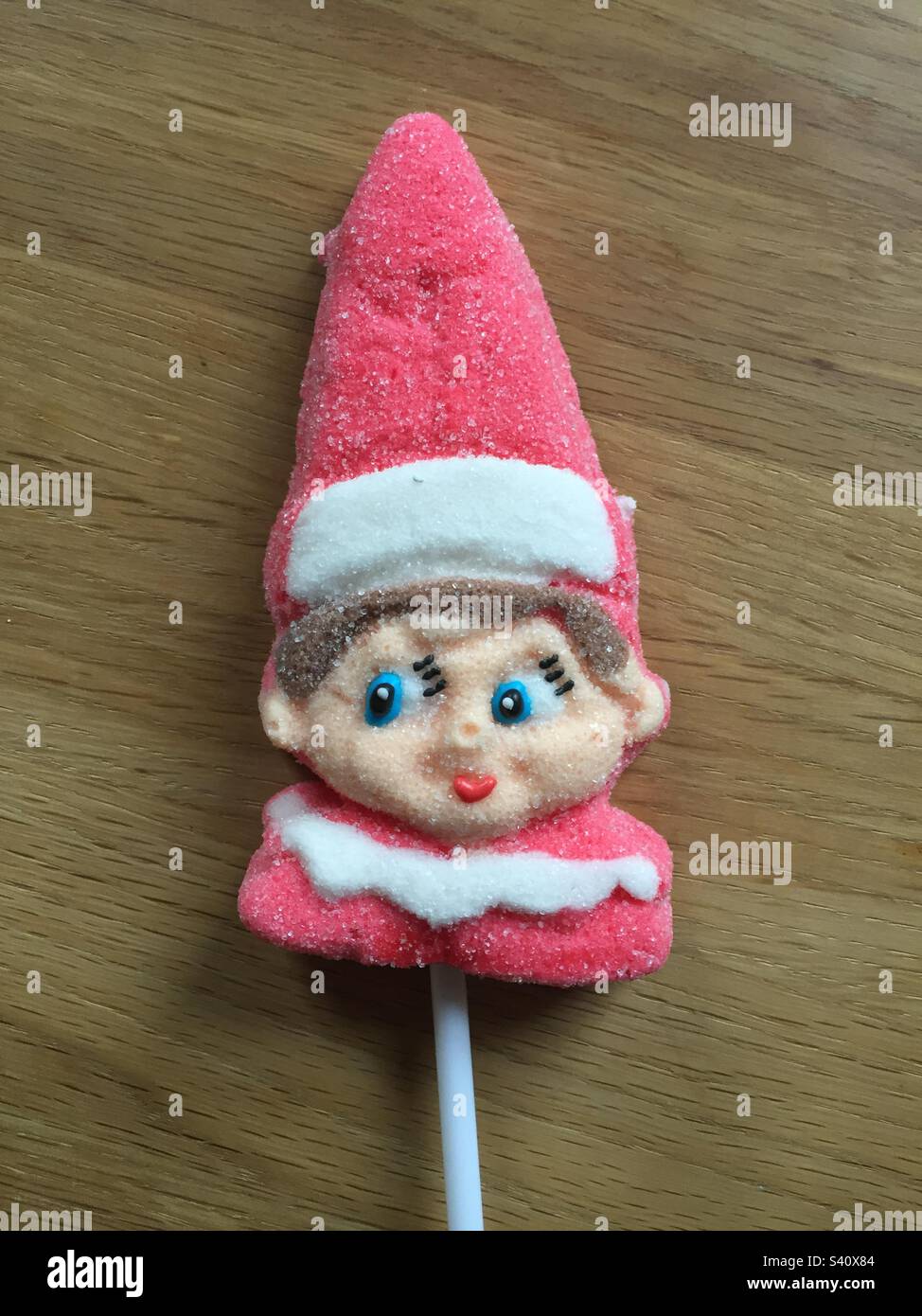 Candy Elf Lollipop brightly coloured and made with sugar. - Smartphone Captured Stock Image