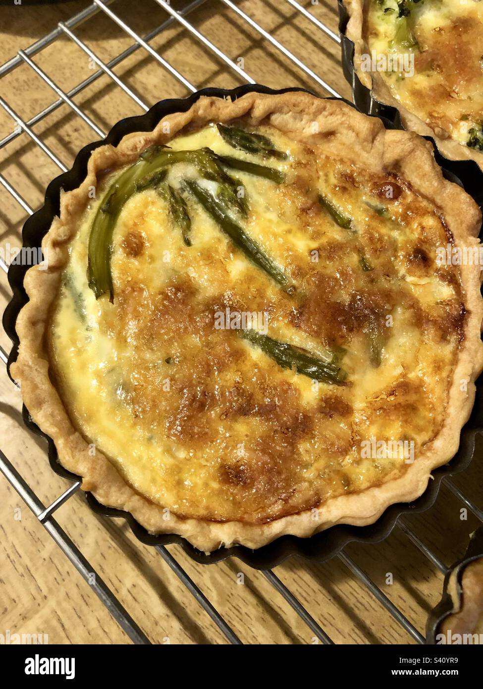 Asparagus quiche on a cooling rack - Smartphone Captured Stock Image