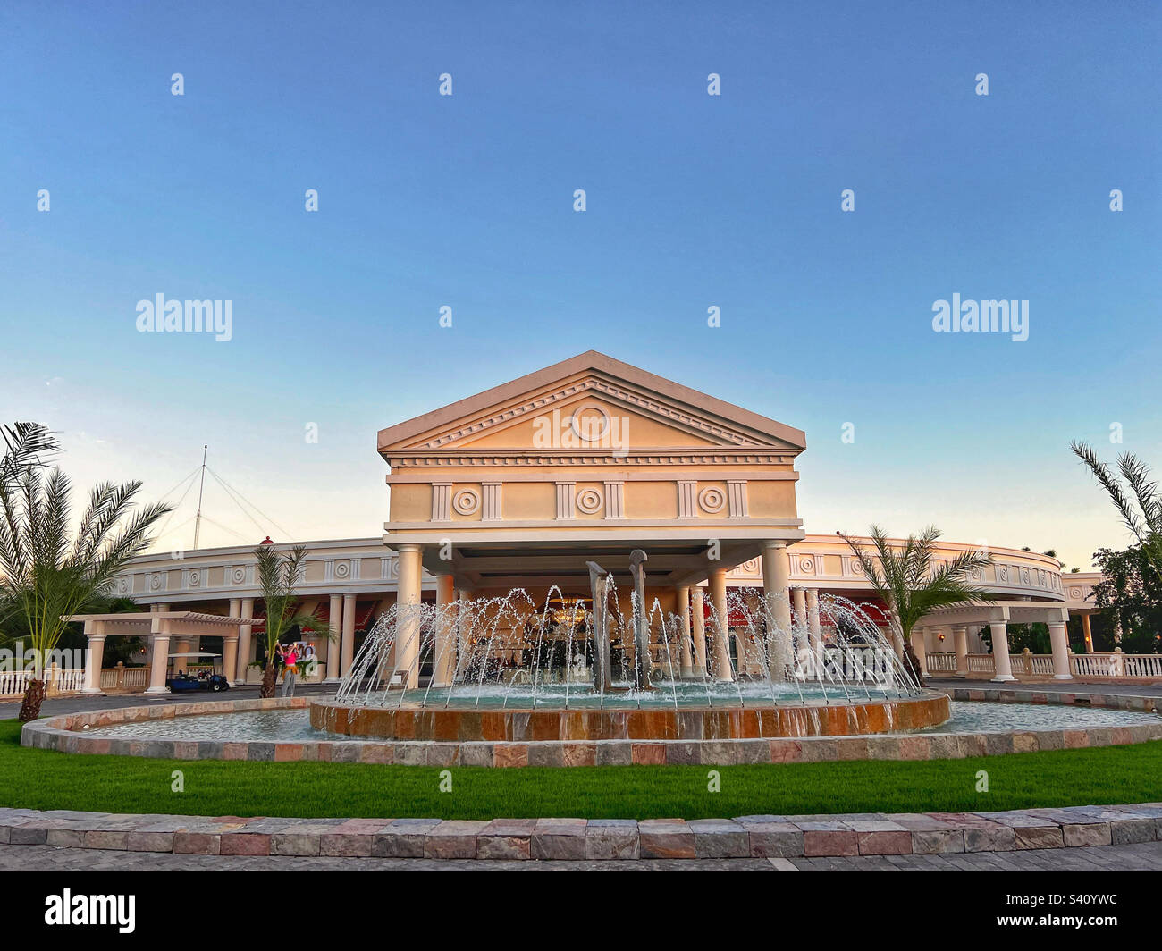 Fountain and front of Iberostar Gran Paraiso all-inclusive adults-only resort in Mayan Riviera Mexico, December 2022 - Smartphone Captured Stock Image
