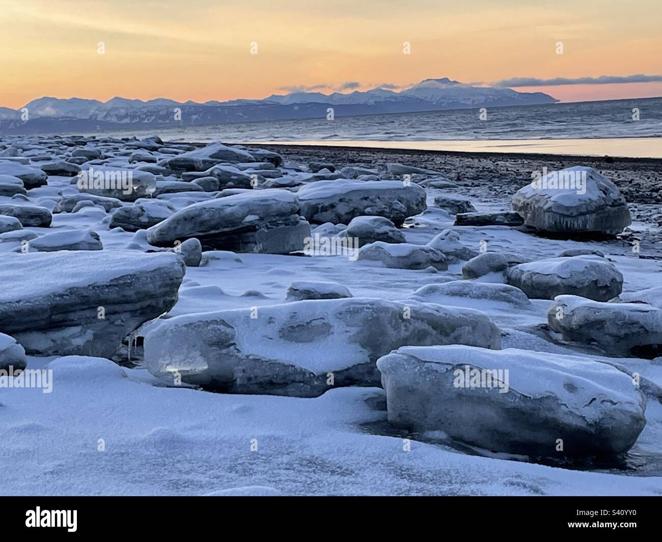 Ice blocks beached by tide, winter, Cook Inlet, Alaska Stock Photo