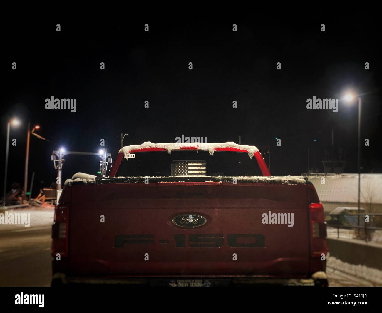 American flag in the rear window of a truck - Smartphone Captured Stock Image