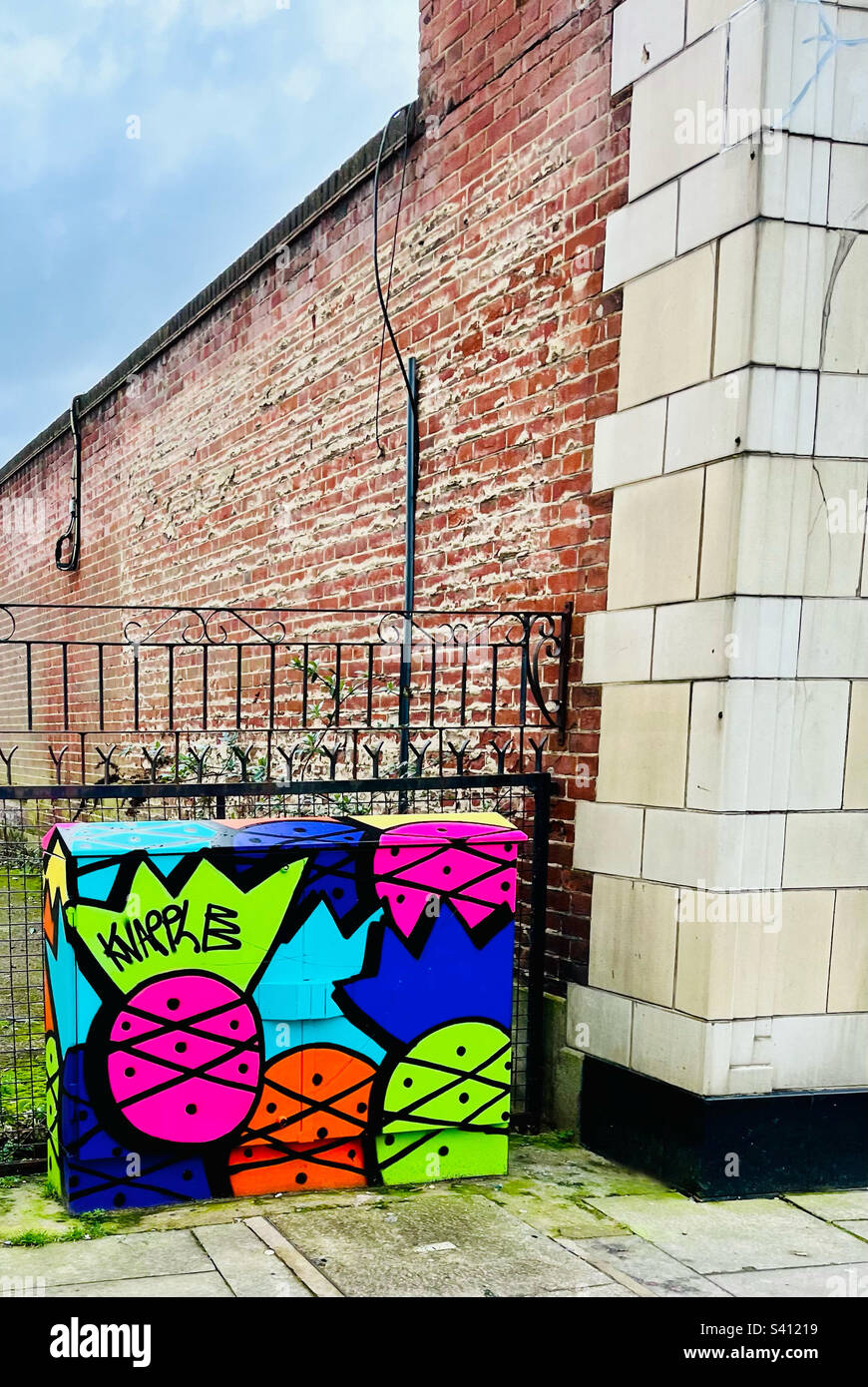 KNAPPLE pineapple street art graffiti. Norwich, England, UK Stock Photo