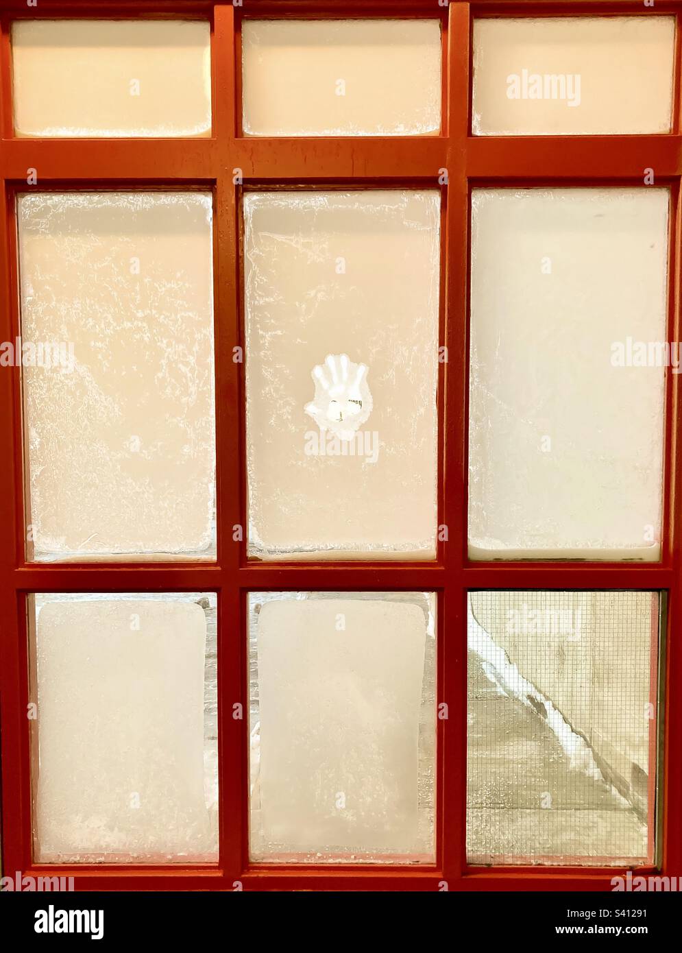 Frosted winter windows with handprint Stock Photo Alamy