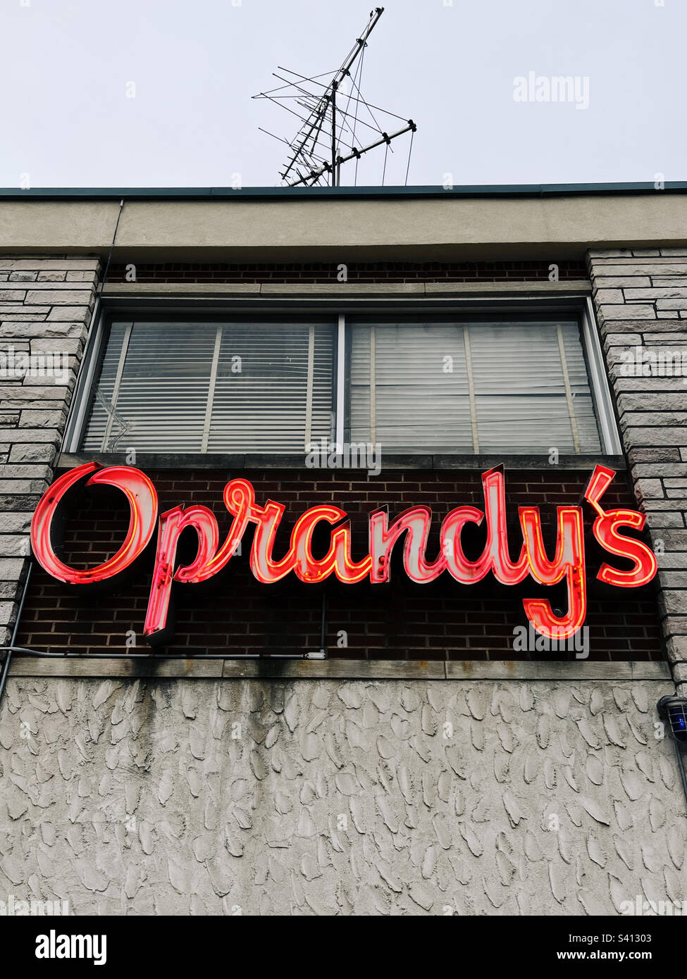 Neon sign for Oprandy’s, a liquor store in Englewood, New Jersey, USA. - Smartphone Captured Stock Image