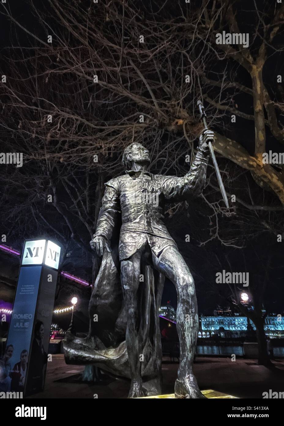 Laurence Olivier’s bronze statue is situated in the corner of Theatre Square and faces the auditorium in the National that bears Olivier's name, sculpture by Angela Conner - Smartphone Captured Stock Image