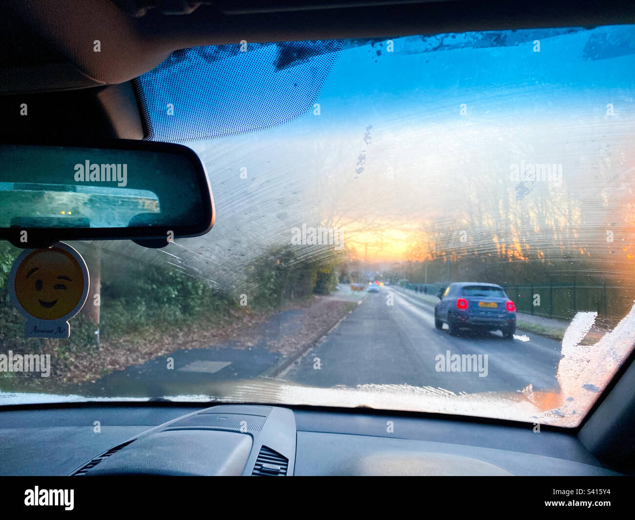 Looking forwards through a frosted windscreen in a parked car on a winter’s morning in The UK - Smartphone Captured Stock Image