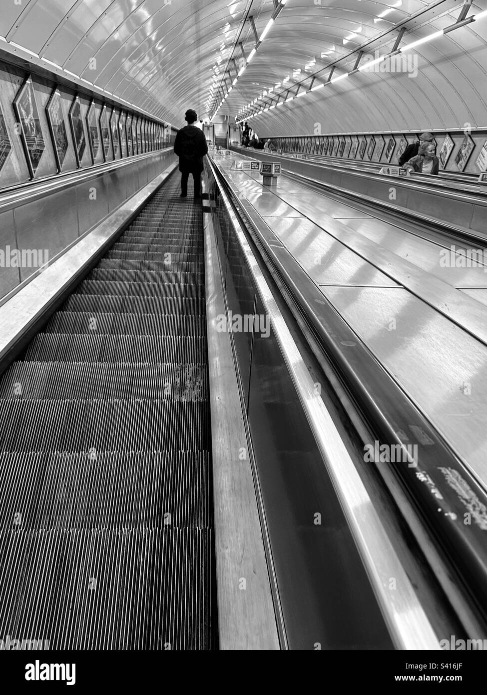 Long escalator at Leicester Square - Smartphone Captured Stock Image
