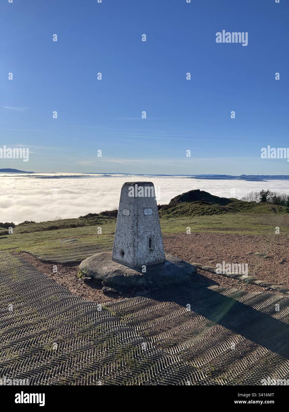 Above the low cloud and fog at the top of the Wrekin, Shropshire Stock Photo