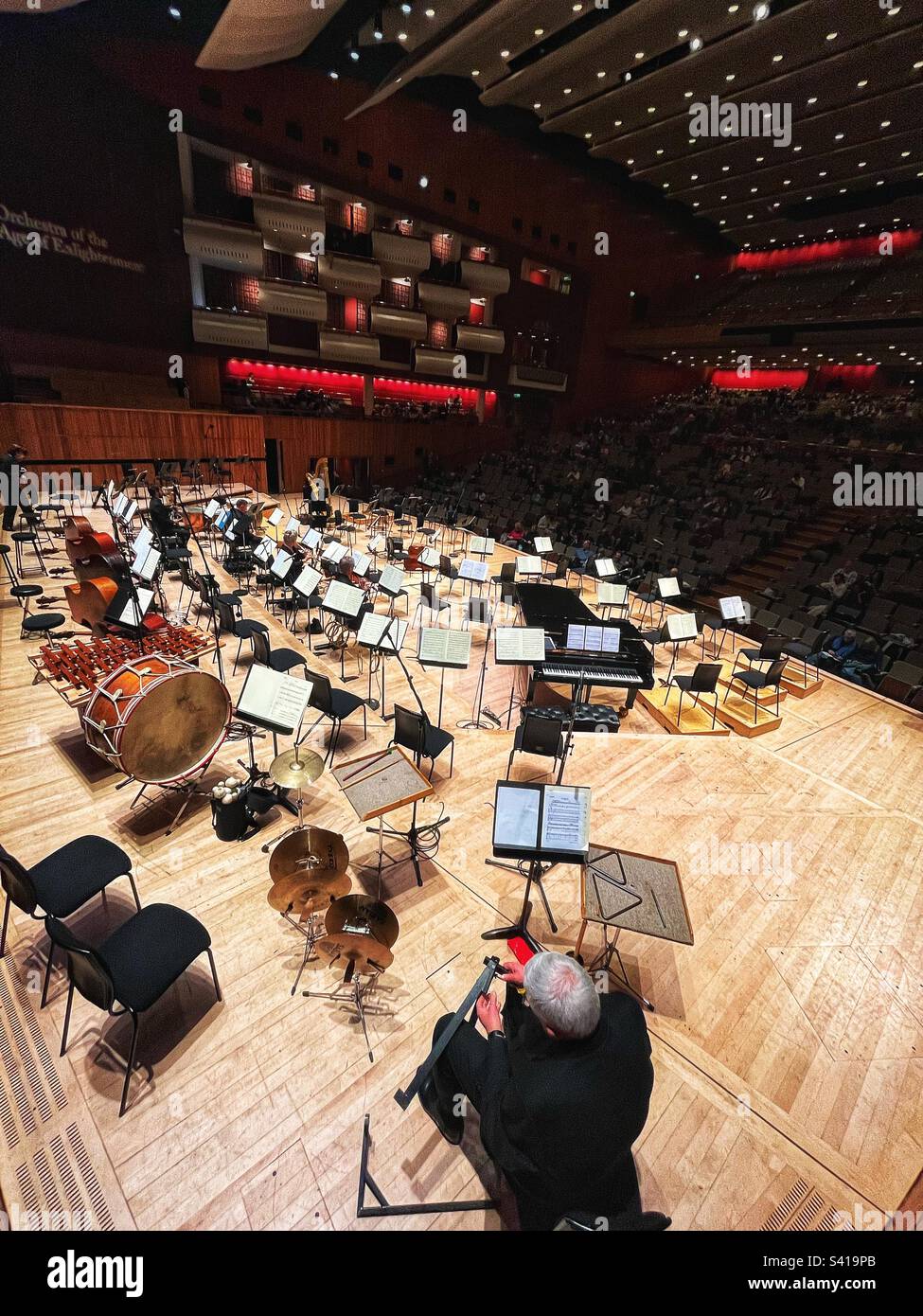 Orchestra of the Age of Enlightenment set the stage at the Royal Festival Hall, London January 2023 with their instruments many are historic - xylophone is a C19th replica - Smartphone Captured Stock Image