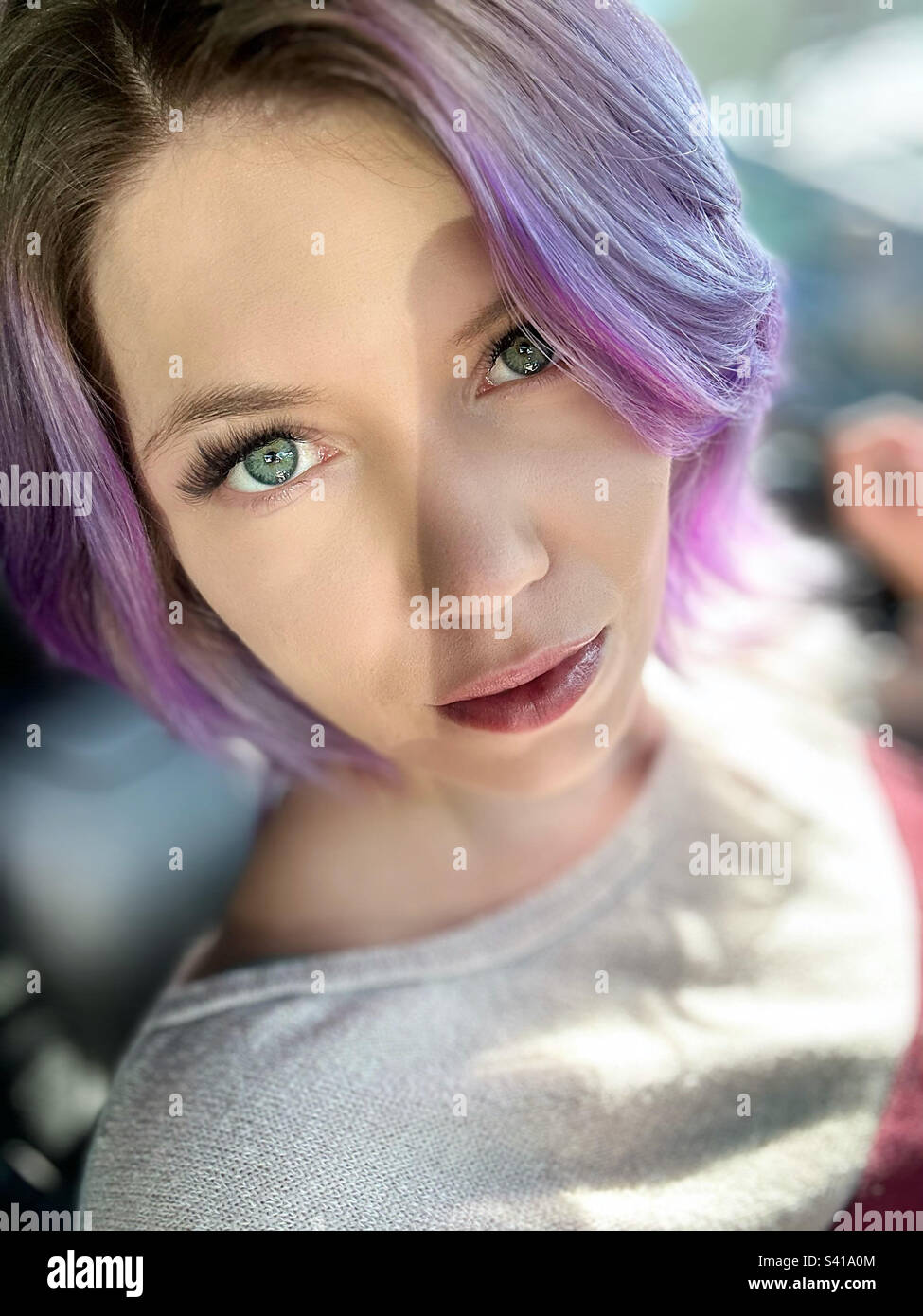 Purple hair blue eyes Stock Photo Alamy