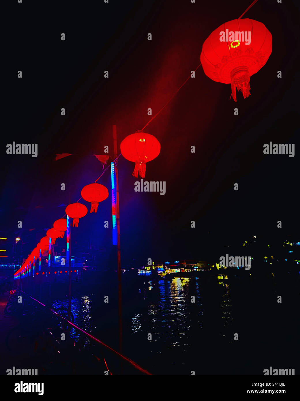 Red lanterns for the Chinese New Year decorating the Yung Shue Wan pier on Lamma island in Hong Kong. Stock Photo