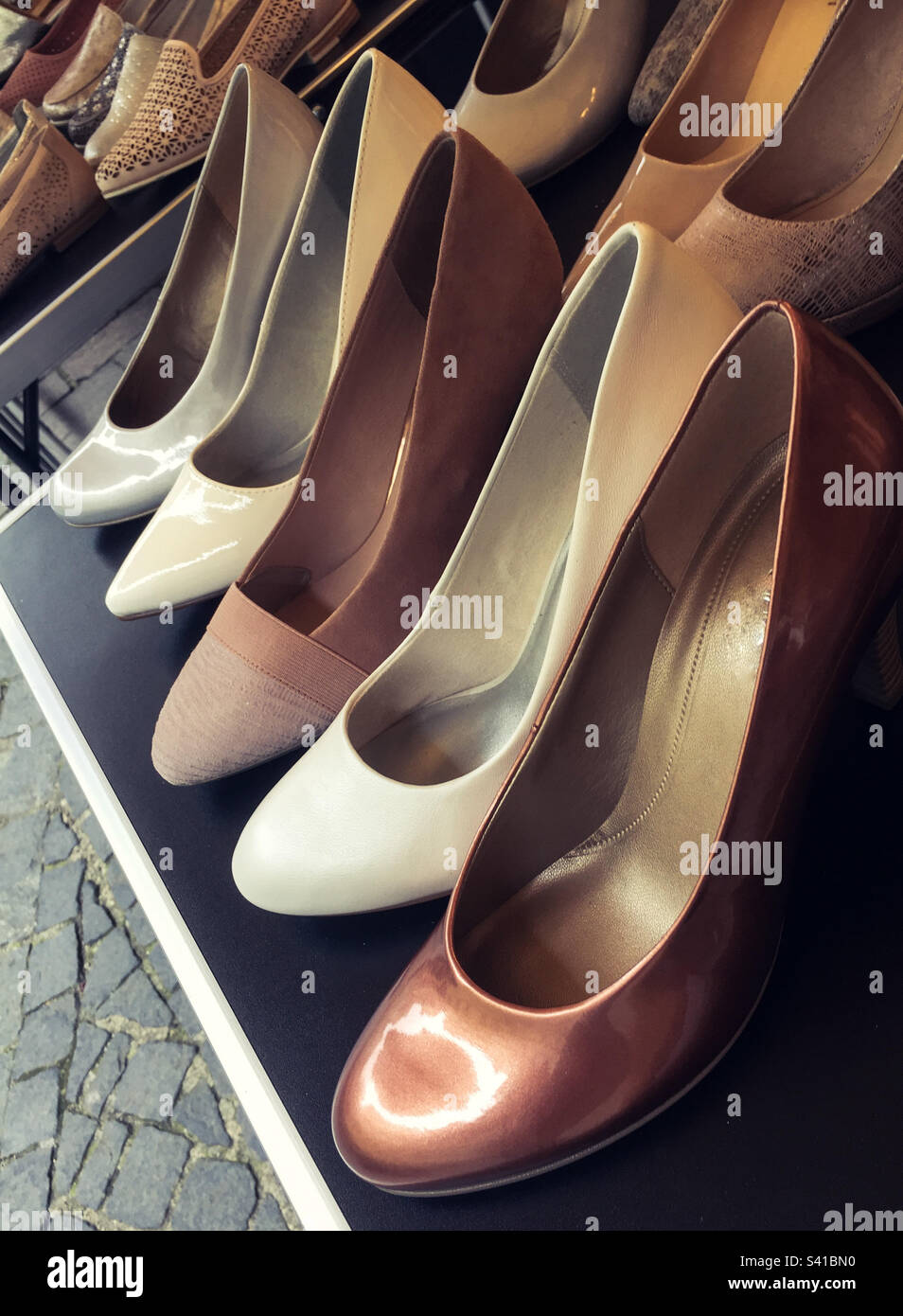 Many women high heels shoes in a row - Smartphone Captured Stock Image