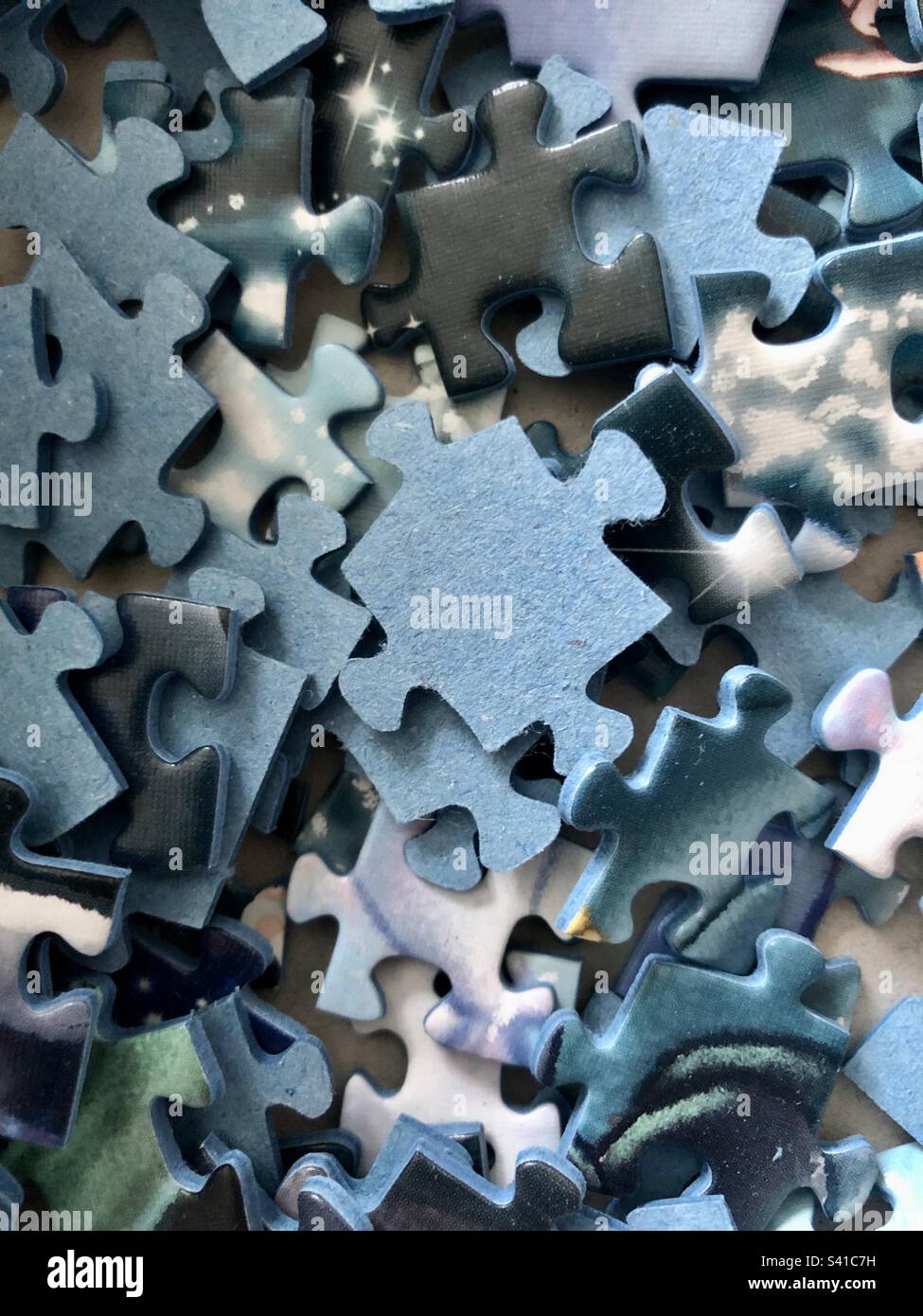 Pile of jigsaw puzzle pieces Stock Photo Alamy