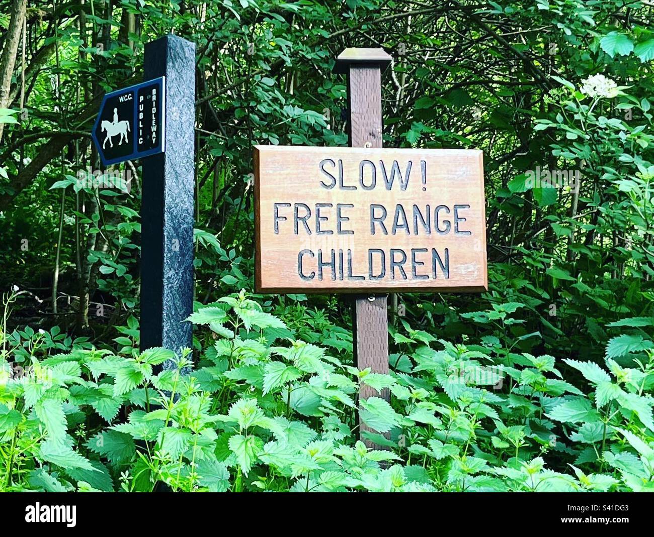 Slow free range children, funny sign, Cotswolds Stock Photo - Alamy