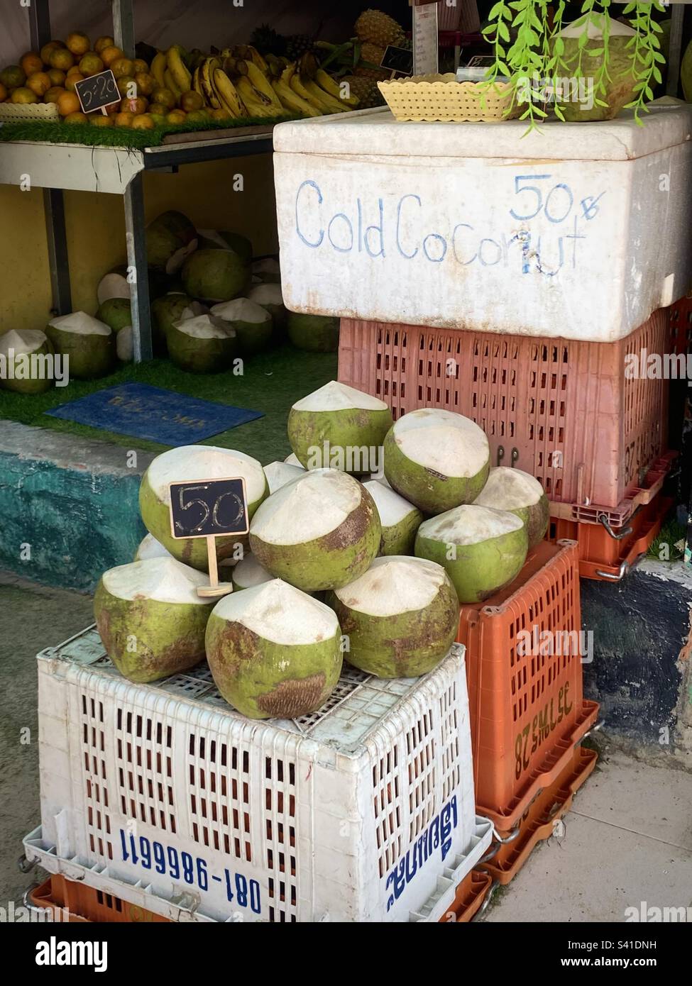 Coconuts for sale, Railay Beach, Ao Nang, Krabi, Thailand Stock Photo