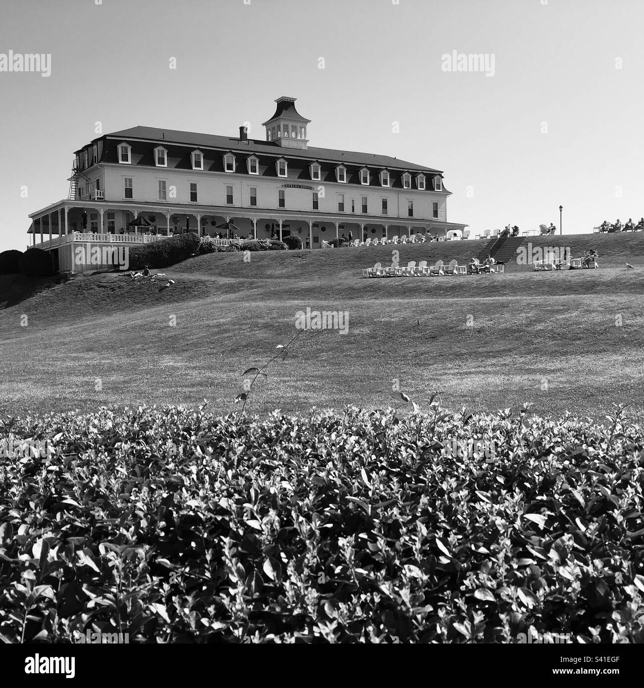 Block Island, Rhode Island black and white photo of hotel and lawn during the summer Stock Photo