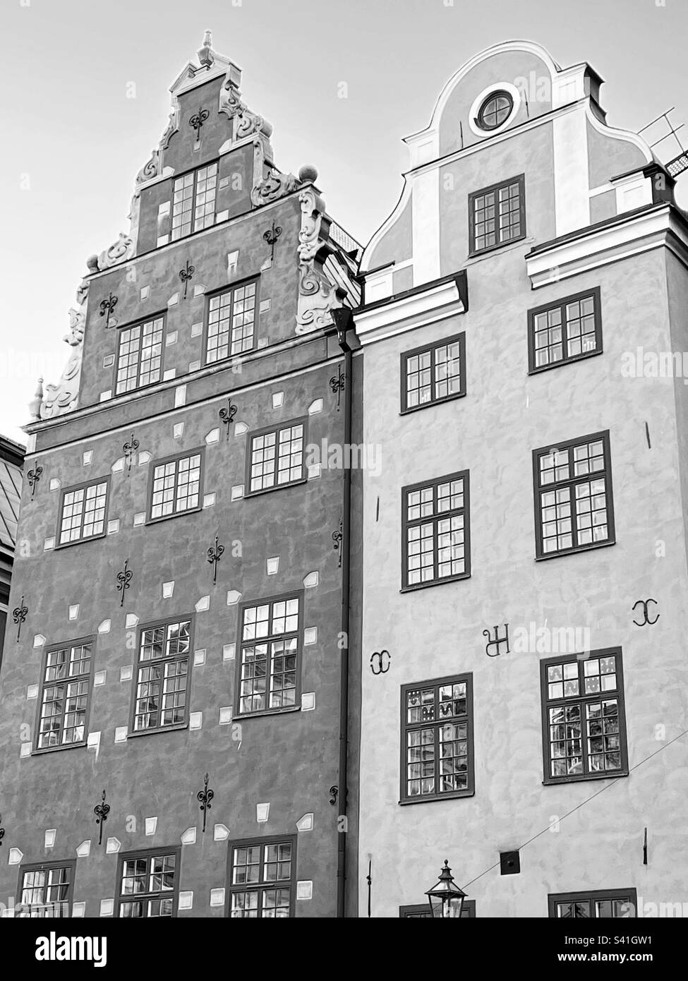 Black and white monochrome picture of two close buildings facade exterior Stock Photo
