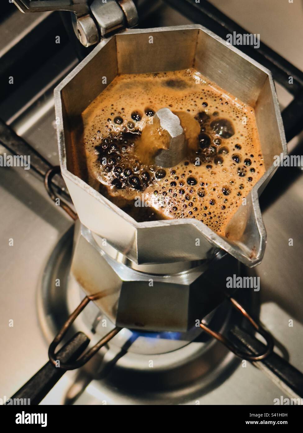 Stove top Bialetti moka pot brewing coffee Phillip Roberts Stock Photo