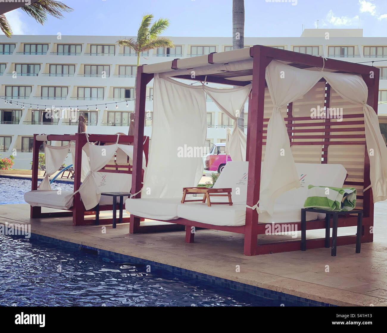 December, 2022, A large and a small cabana by the pool, Hyatt Ziva Cancun, Punta Cancun, Hotel Zone, Cancun, Quintana Roo, Mexico - Smartphone Captured Stock Image
