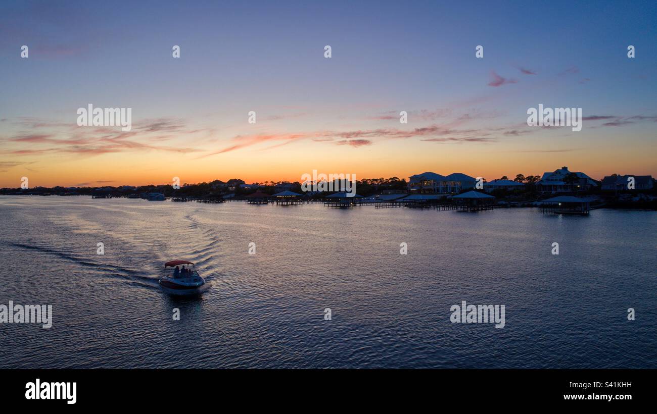 Boat at sunset in Orange Beach, Alabama - Smartphone Captured Stock Image