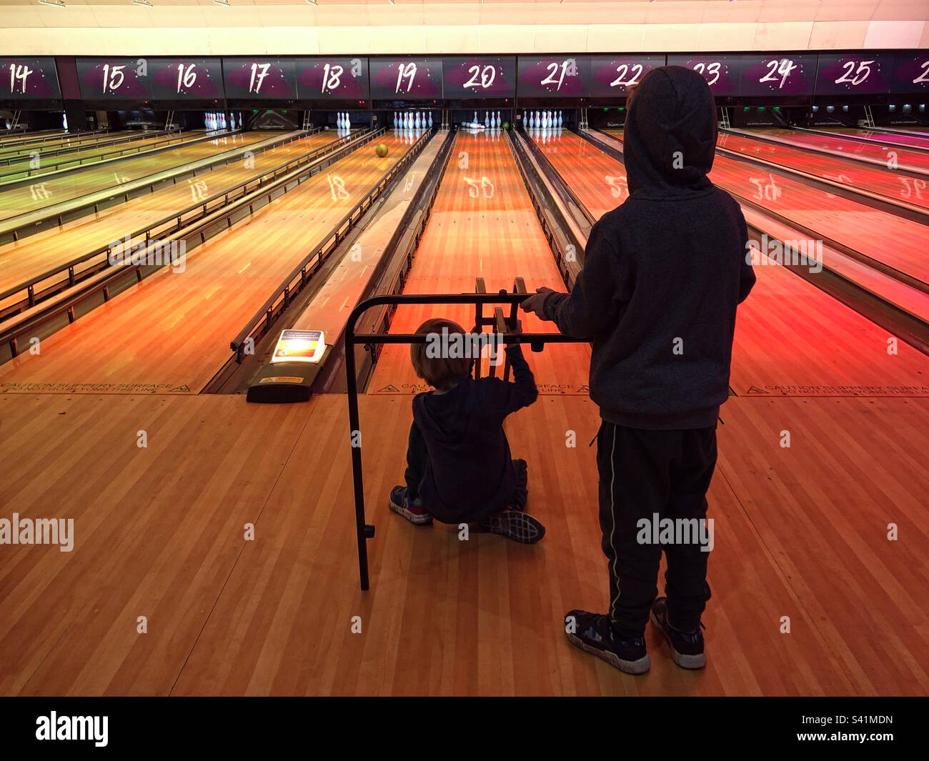 Bowling with kids Stock Photo Alamy