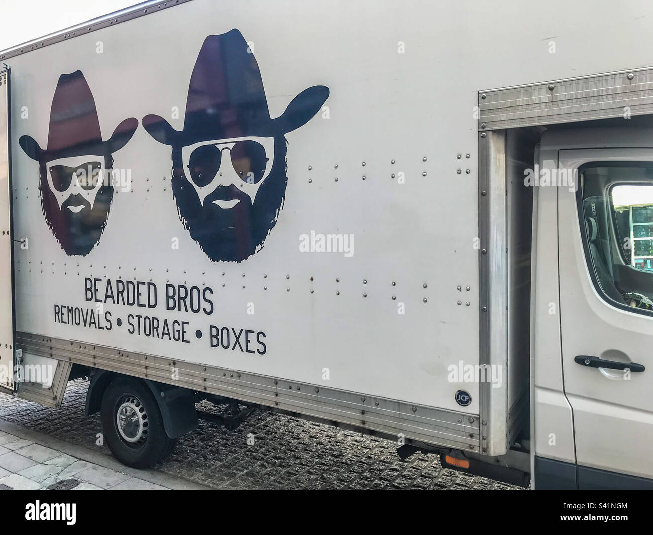 Breastfed brothers removals - Smartphone Captured Stock Image
