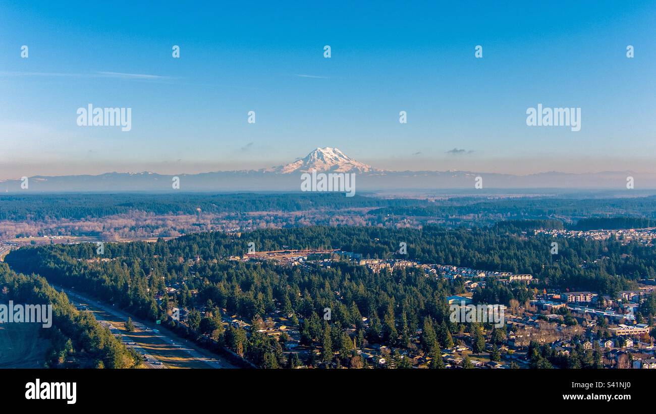Aerial view of Mount Rainier and Lacey, Washington in December Stock