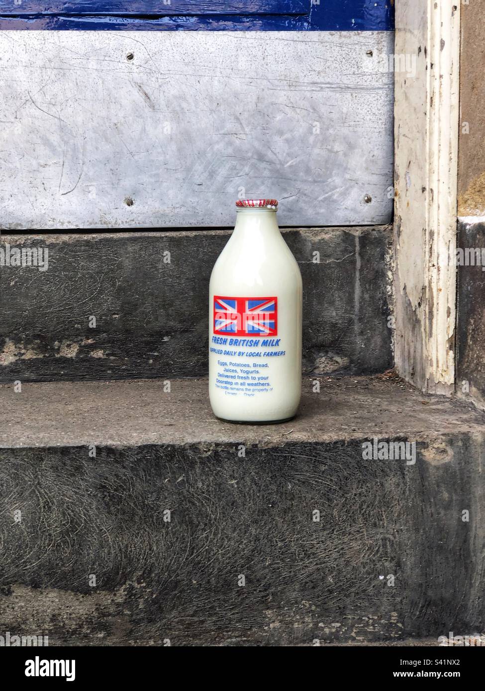 Pint of milk delivered on doorstep Stock Photo Alamy