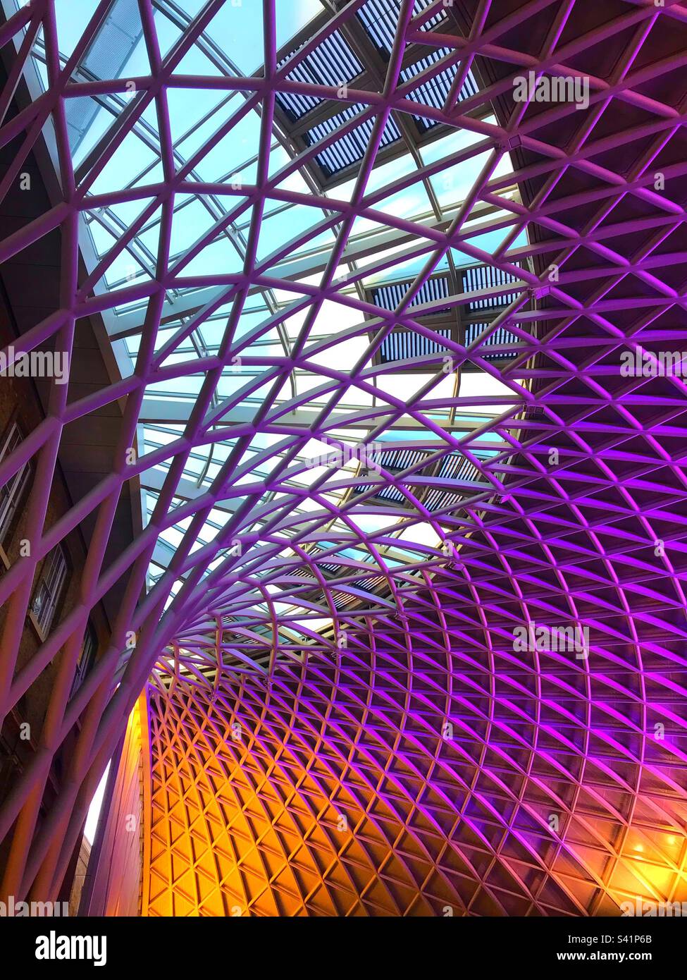 The beautiful colours of the sculpture in the roof of Kings Cross