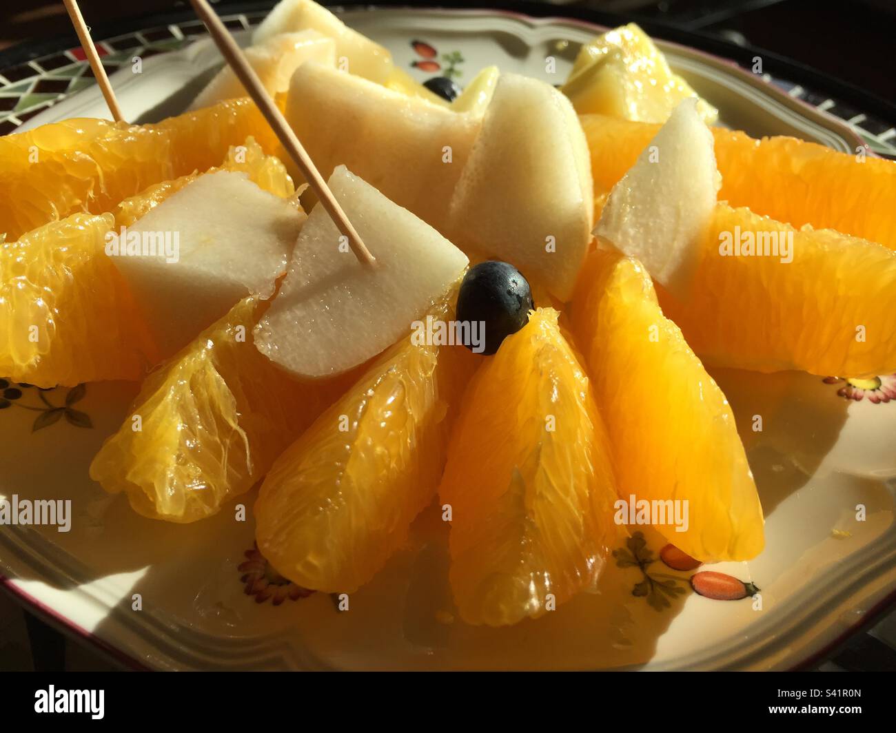 Orange and pear fruit plate Stock Photo