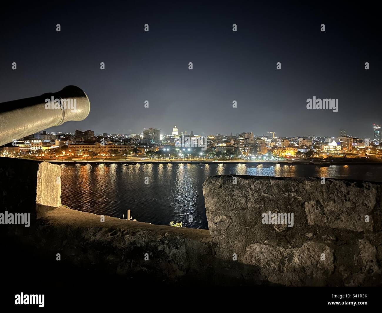 Havana seen from ‘La Cabaña’ fortress at 9:00pm right after ‘El Cañonazo’. Cuban traditions. Stock Photo