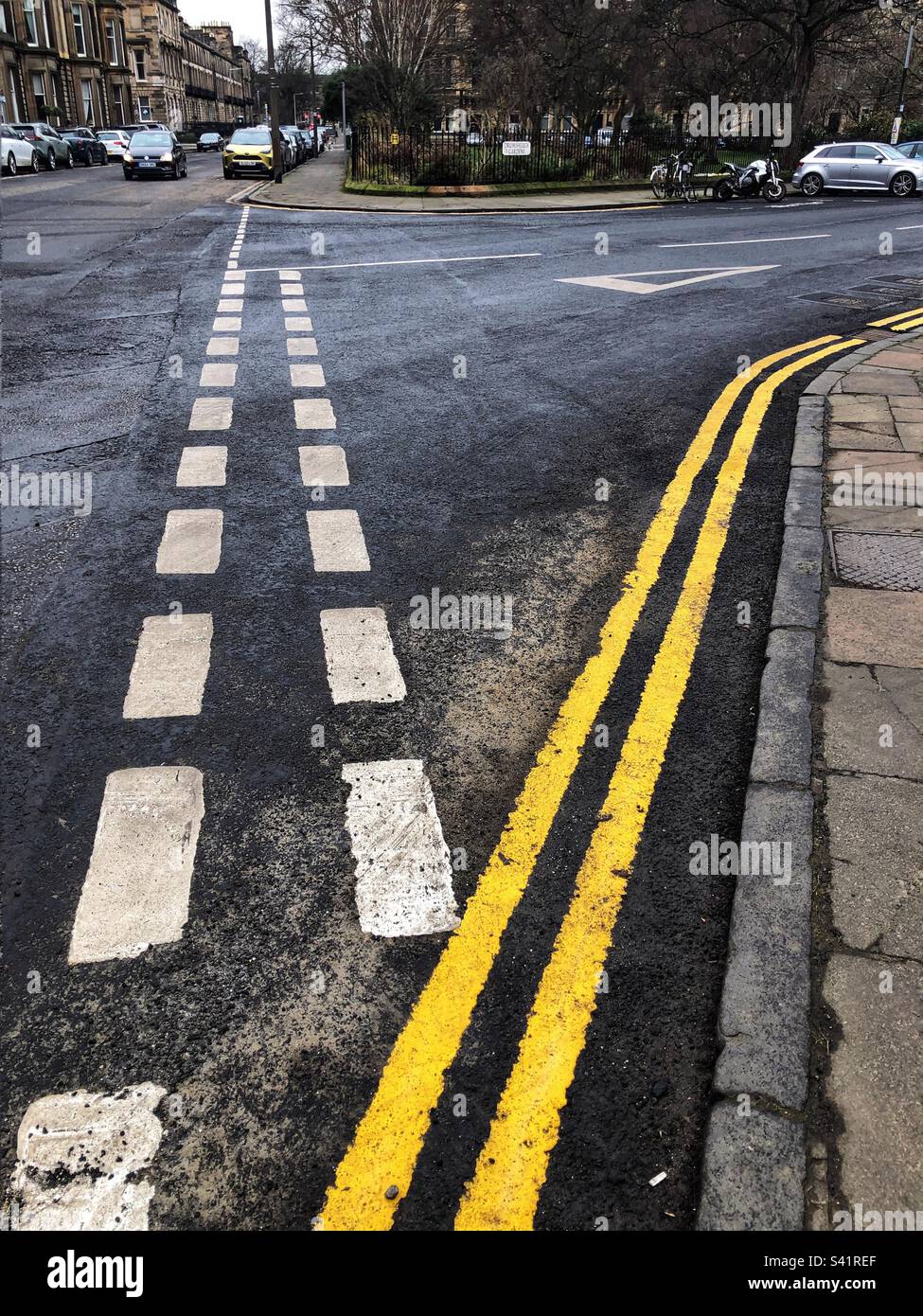 Give way road markings at junction Stock Photo