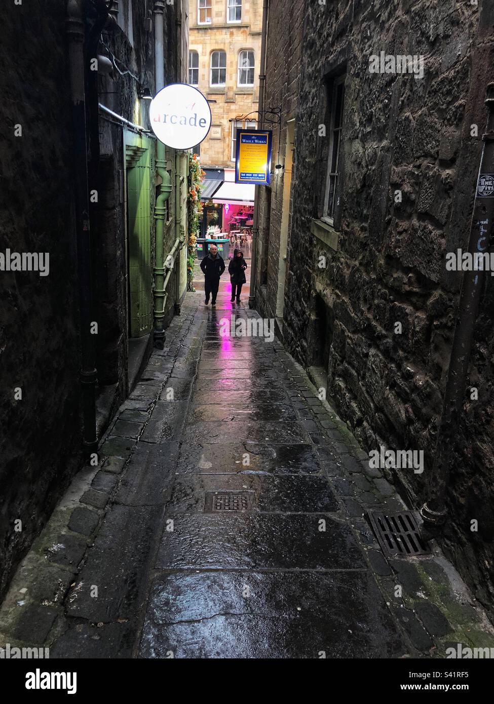 Secret arcade vodka bar in alley - Smartphone Captured Stock Image Secret arcade vodka bar in alley - Smartphone Captured Stock Image