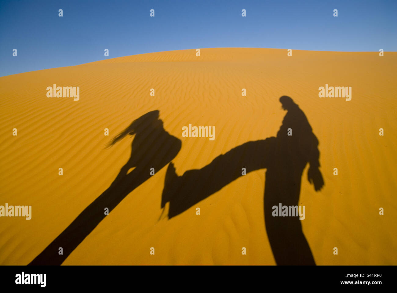 Shadow play in the desert of Oman - Smartphone Captured Stock Image