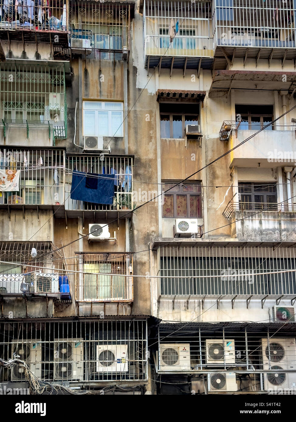 Crowded old concrete housing blocks in Macao, China Stock Photo