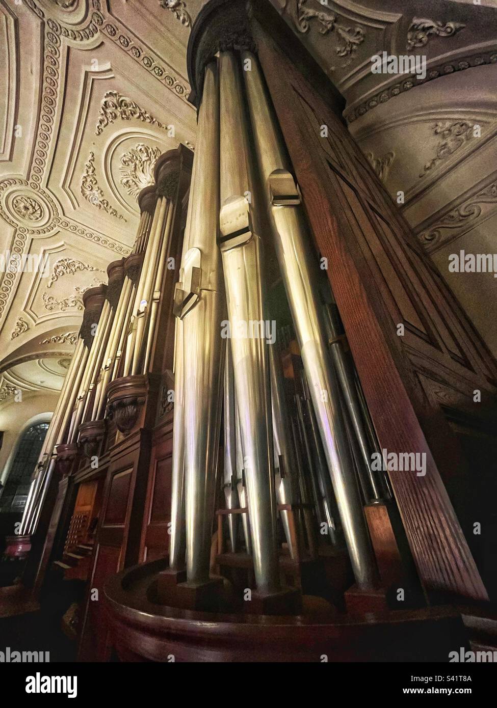 Side perspective of the mighty pipe organ in the church - St Martin’s in the Fields - London - Smartphone Captured Stock Image