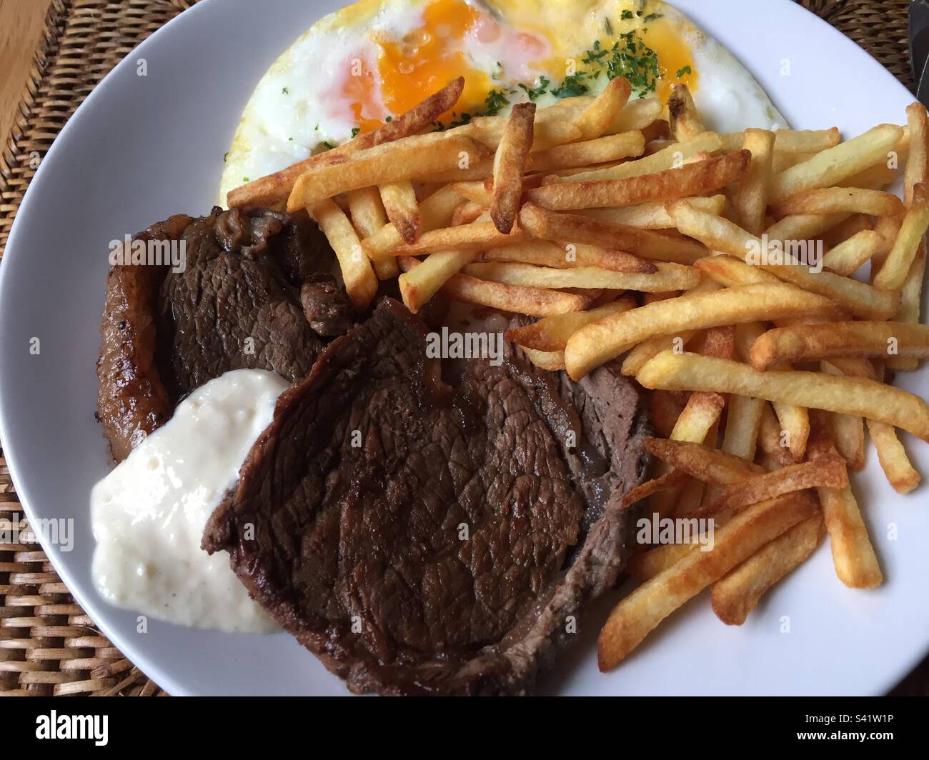 Steak, eggs and chips. Sirloin & rump steaks with lightly frambled eggs