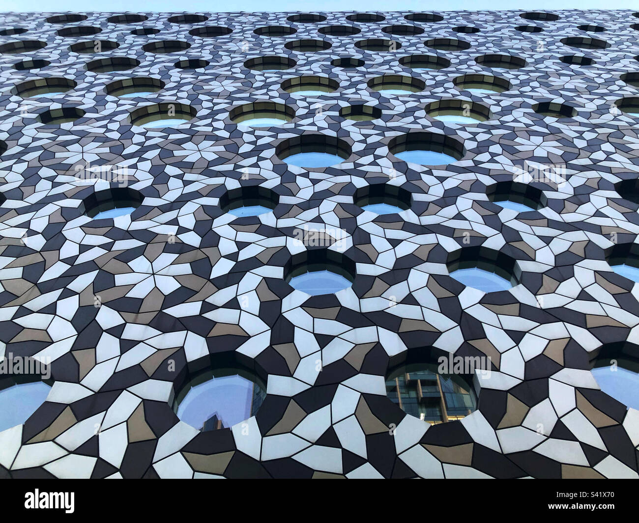 Geometric patterns and windows on a building in Greenwich, London - Smartphone Captured Stock Image