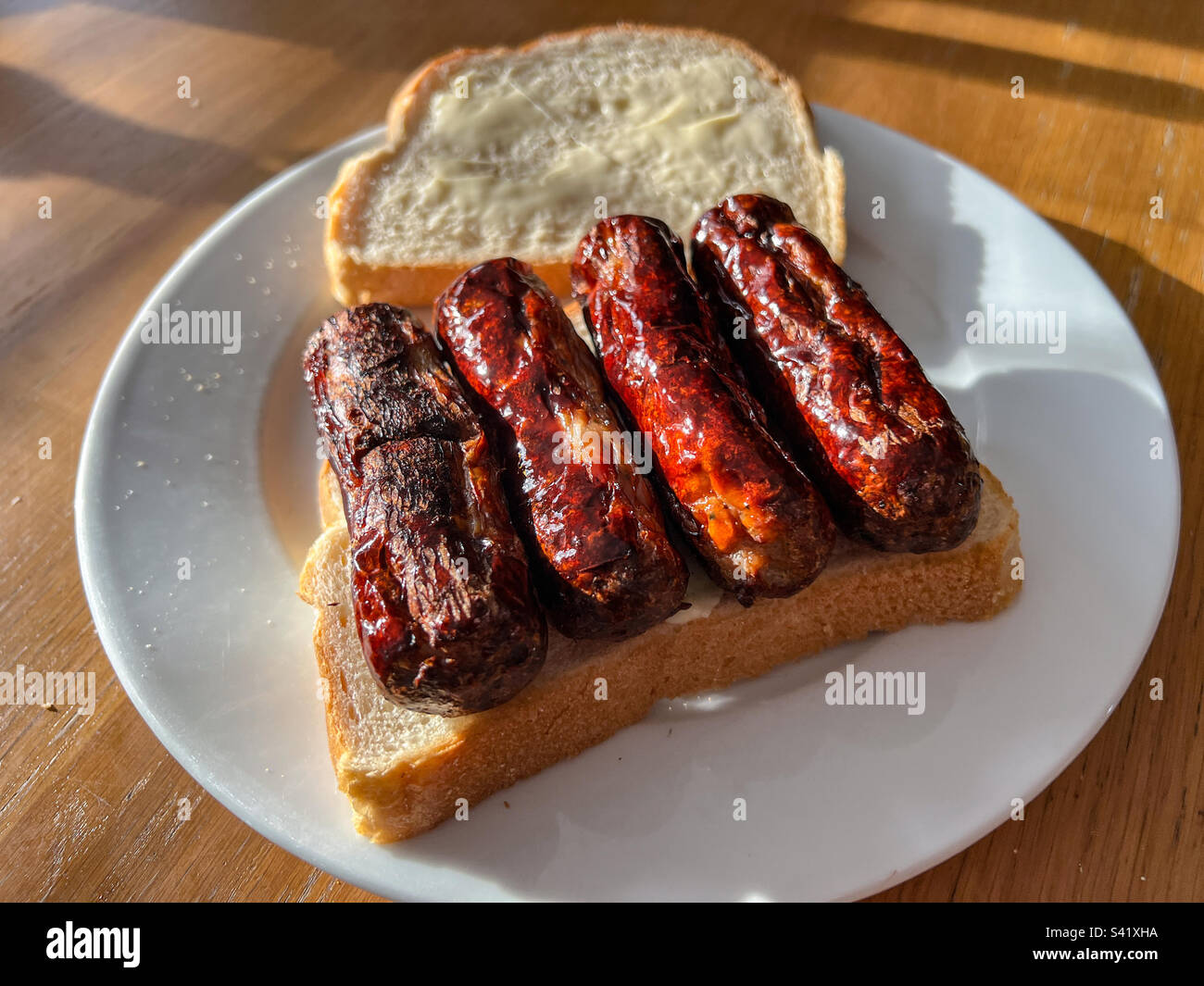 Sausage sandwich on white bread - Smartphone Captured Stock Image