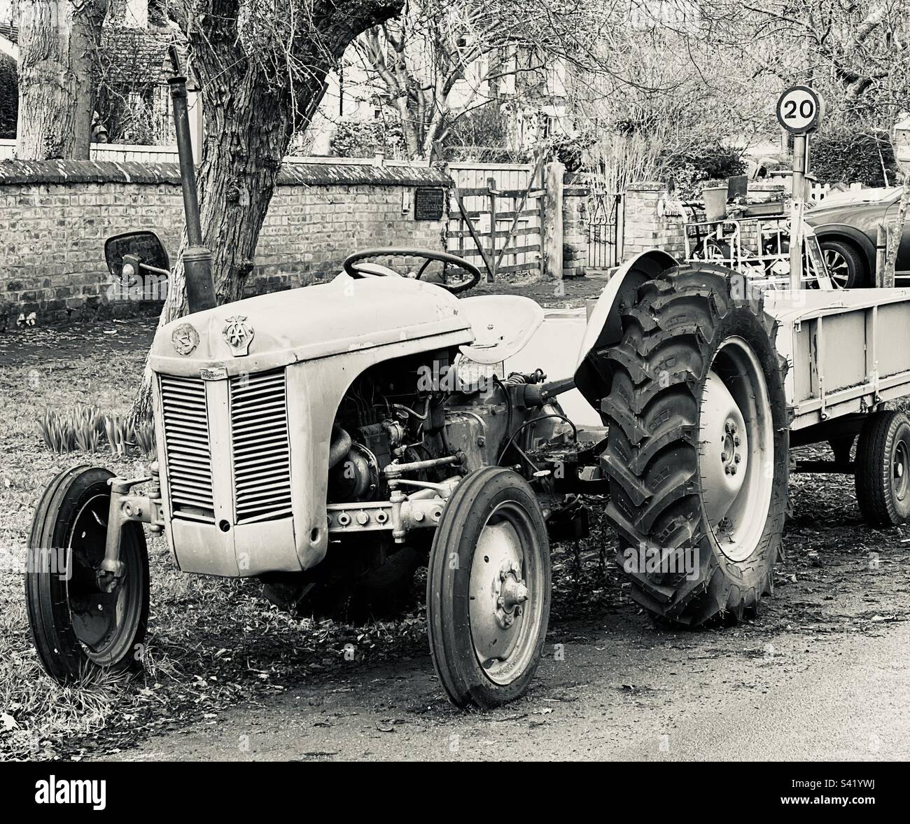 Old fashioned tractor in black and white Stock Photo Alamy