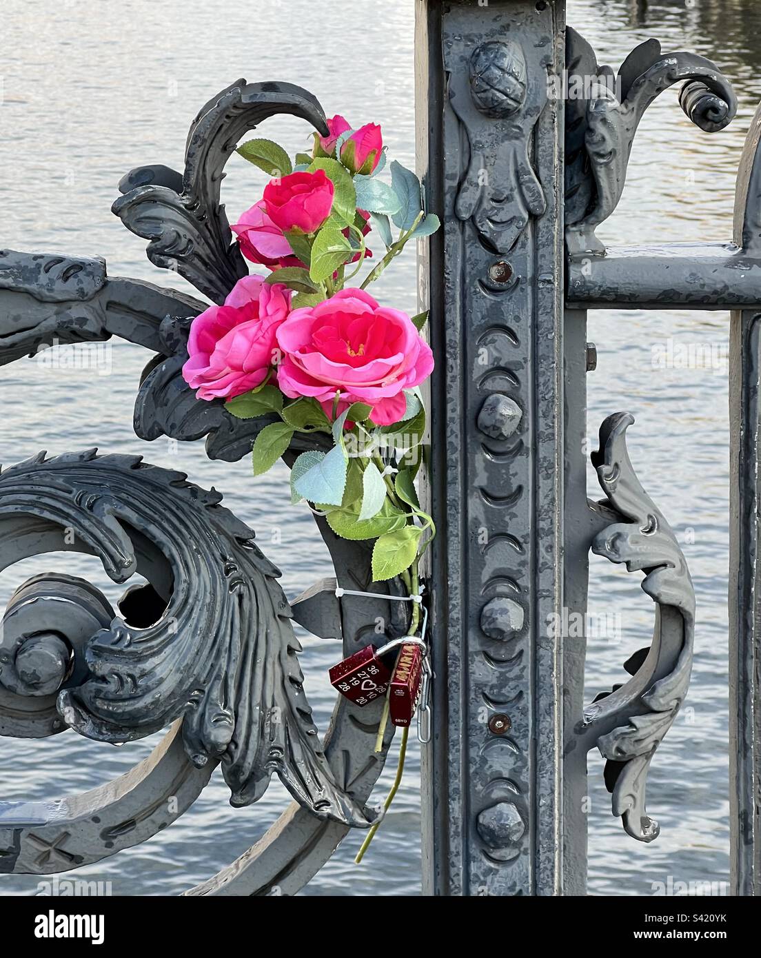 Lovelocks and flowers on Weidendammer bridge over Spree river, Mitte, Berlin - Smartphone Captured Stock Image