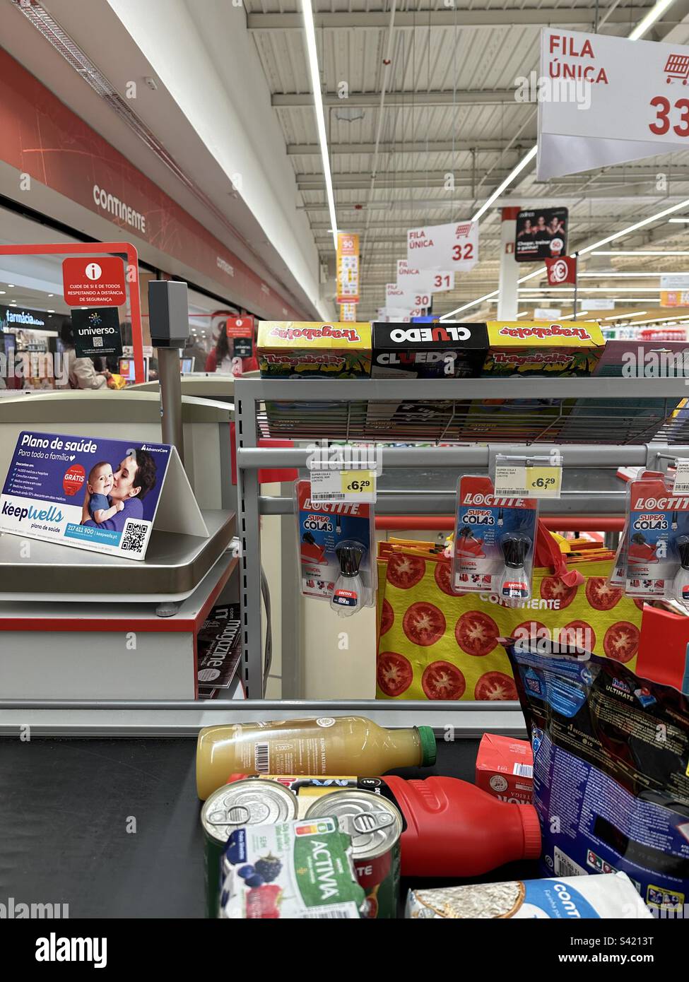 Supermarket checkout counter. Lisbon, Portugal Stock Photo Alamy