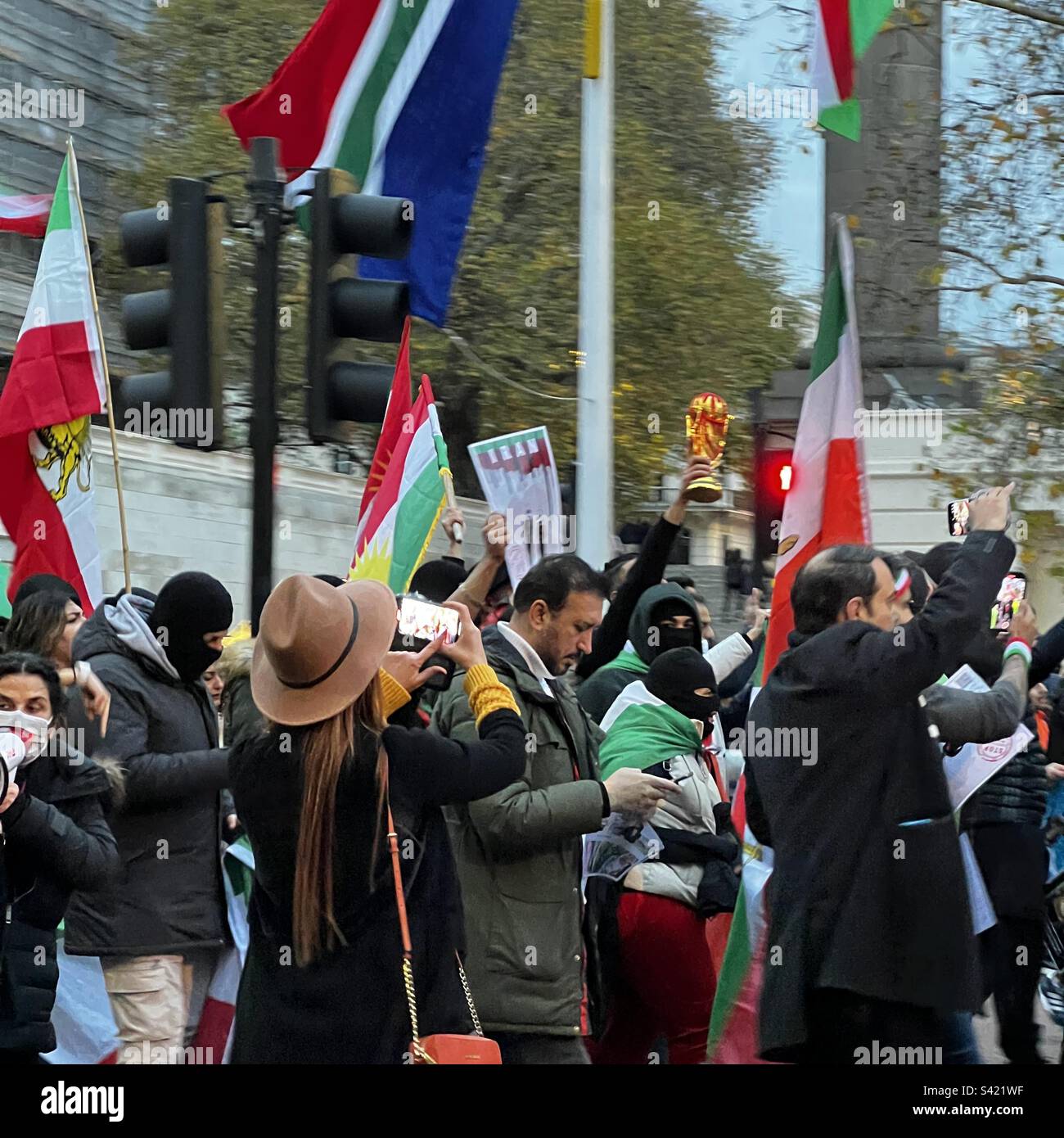 Women. Life. Freedom - protest in support of women’s rights in Iran - London 26 November 2022 - Smartphone Captured Stock Image
