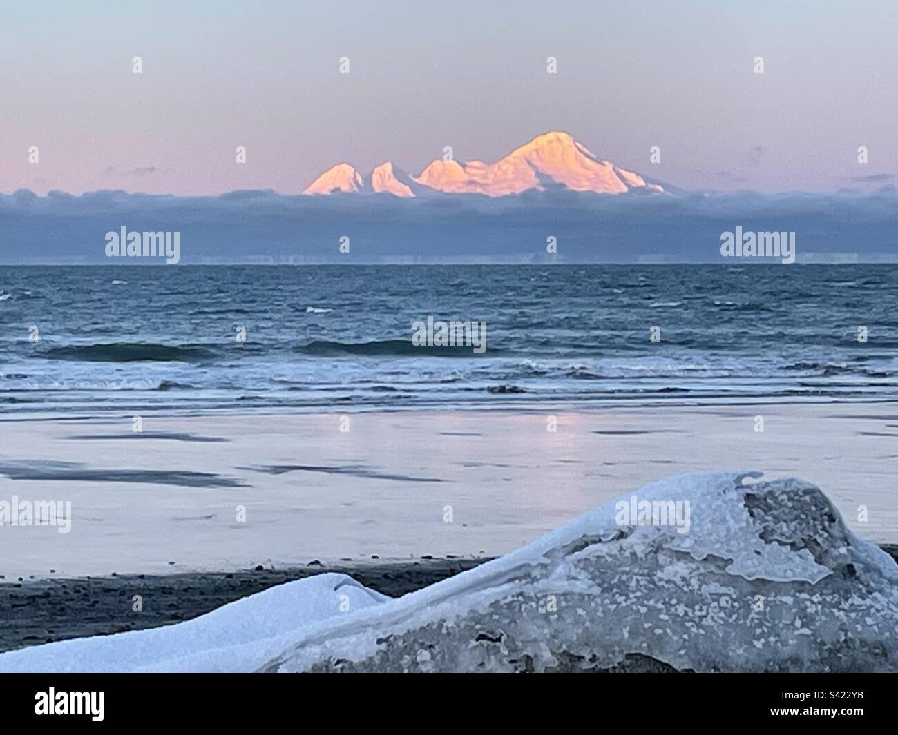 Sunrise on Iliamna volcano, winter, Cook Inlet, Alaska Stock Photo