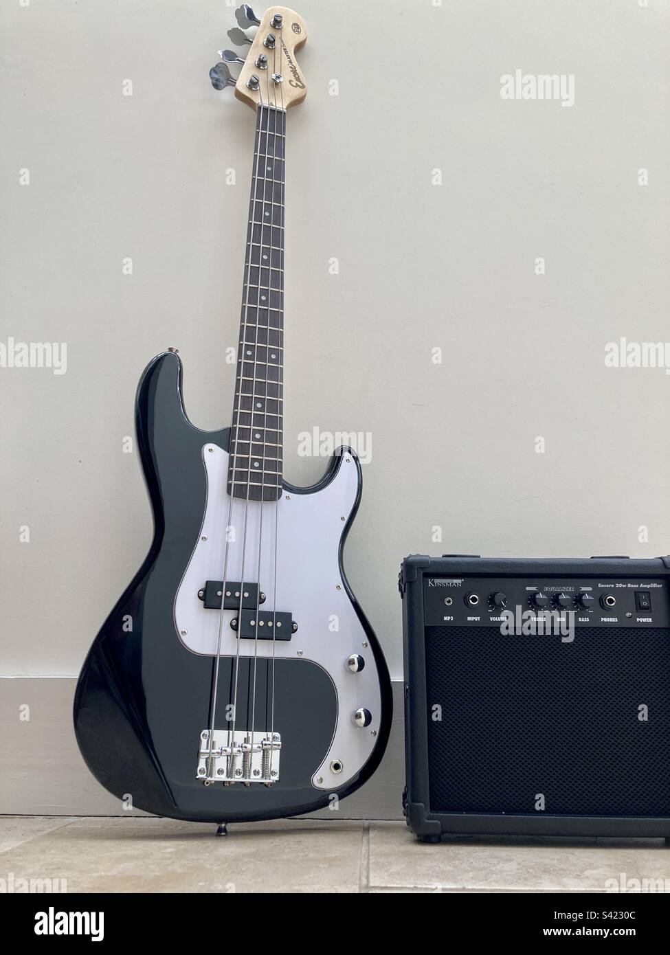Bass guitar and amp Stock Photo Alamy