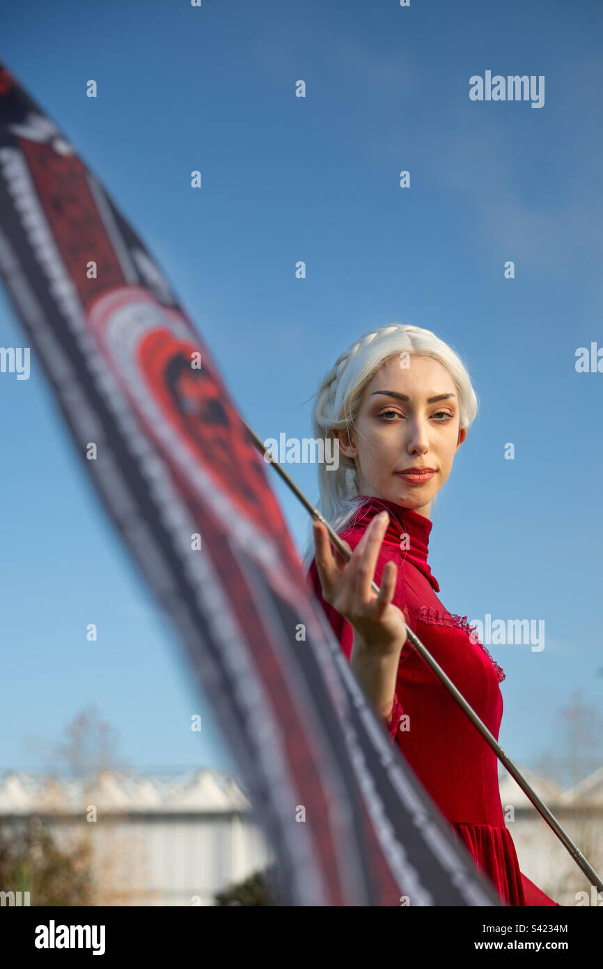 Girl cosplay in Game of Thrones character Targaeryan - Smartphone Captured Stock Image